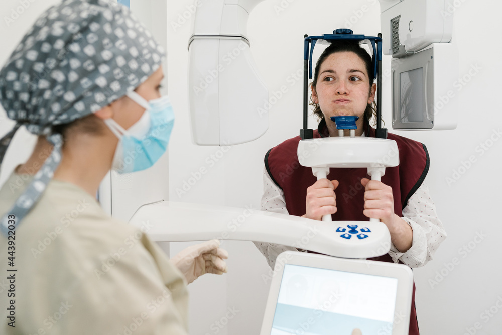 Woman in Dental X-Ray Machine